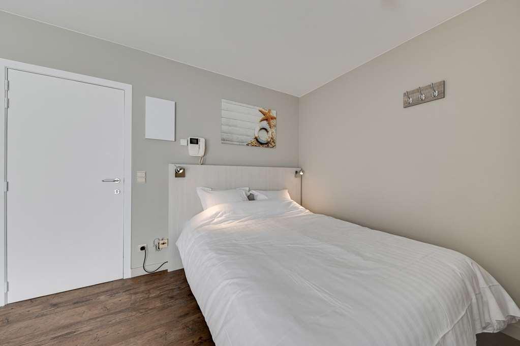 Holiday Suites De Haan Pokoj fotografie